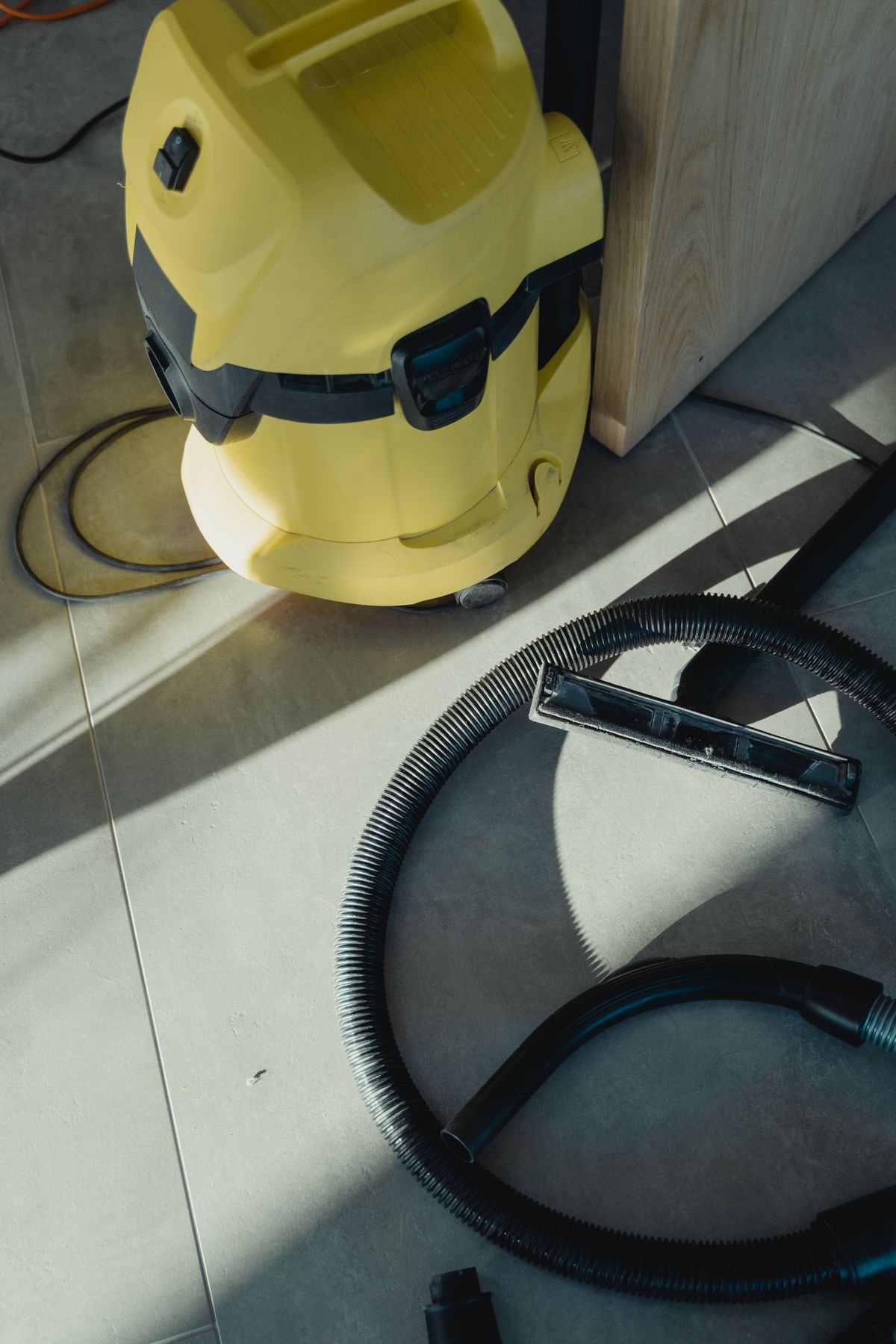 Cleaner using commercial floor equipment in a large open space